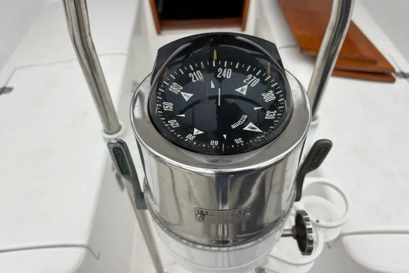 Slide: The Image of Compass on 1979 Islander Peterson 40 sailboat, showing navigation details. - 14