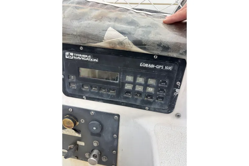 Slide: The Image of Control panel of a 1979 Islander Peterson 40 with Trimble Navigation LORAN-GPS 10X. - 17