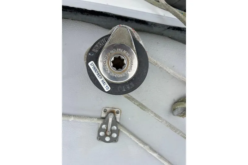 Slide: The Image of Winch labeled "Spinnaker Halyard" on 1979 Islander Peterson 40 sailboat deck. - 27