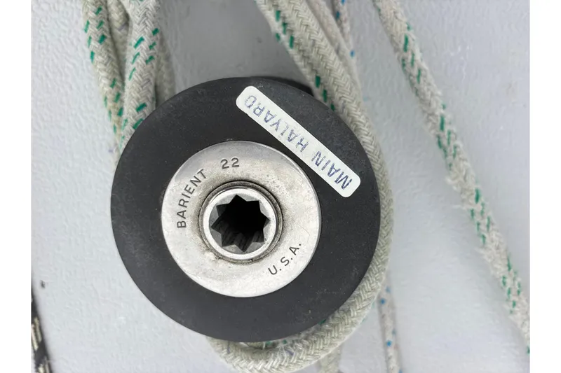 Slide: The Image of Barient 22 winch on 1979 Islander Peterson 40 sailboat with ropes. - 29