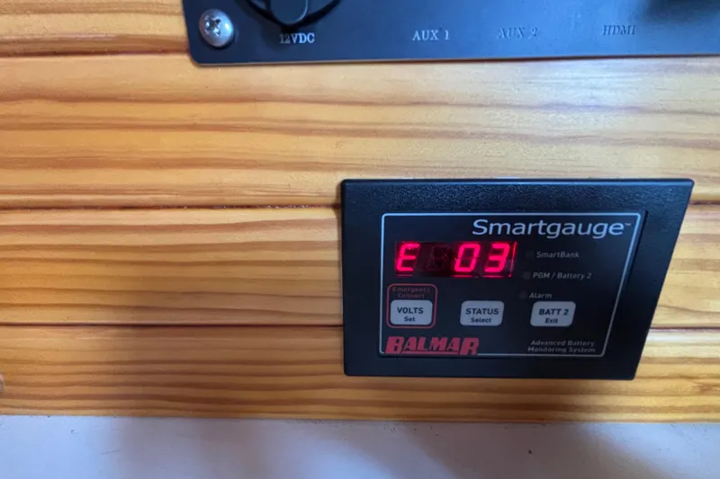 Slide: The Image of Balmar Smartgauge displaying battery status on 1979 Islander Peterson 40 yacht. - 60