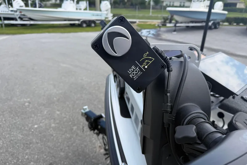 Slide: The Image of Close-up of Live Foot control on 2023 Phoenix 921 Elite II boat. - 11