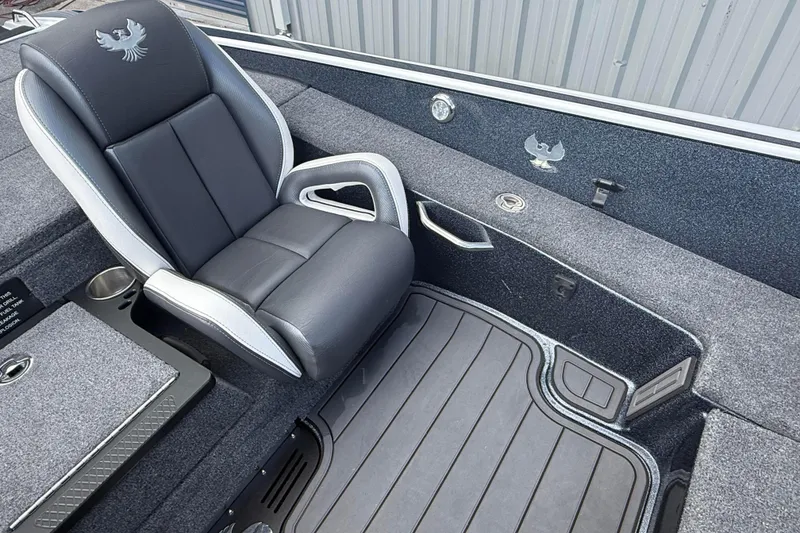 Slide: The Image of Luxurious seating in 2023 Phoenix 921 Elite II boat, featuring sleek design and premium materials. - 28