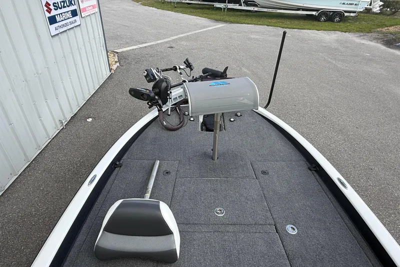 Slide: The Image of 2023 Phoenix 921 Elite II boat deck with trolling motor and seat, near Suzuki Marine dealer. - 30