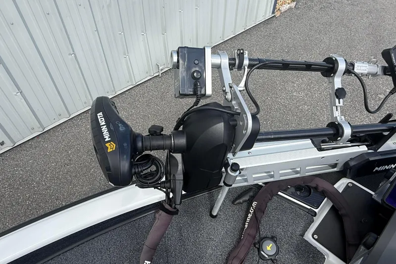 Slide: The Image of 2023 Phoenix 921 Elite II boat with Minn Kota trolling motor and advanced fishing equipment. - 32