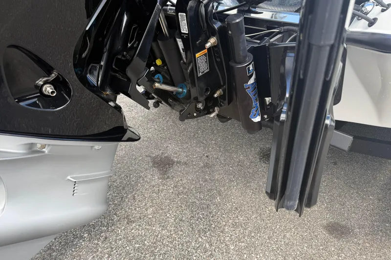 Slide: The Image of 2023 Phoenix 921 Elite II boat motor and hydraulic system close-up. - 5