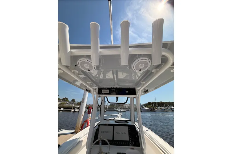 Slide: The Image of Sea Hunt Ultra 275 SE 2025 with Garmin equipment at dock. - 13