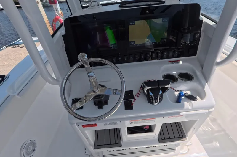 Slide: The Image of Interior view of 2025 Sea Hunt Ultra 275 SE with storage compartment. - 20