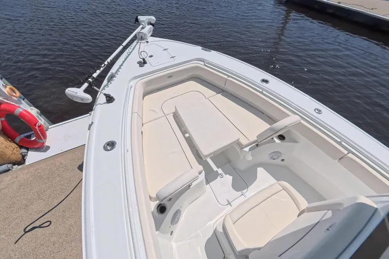 Slide: The Image of 2025 Sea Hunt Ultra 275 SE helm with advanced electronics. - 25