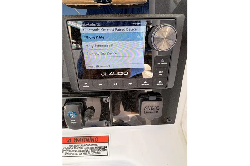Slide: The Image of JL Audio system on Sea Hunt Ultra 275 SE boat, Bluetooth connection. - 26