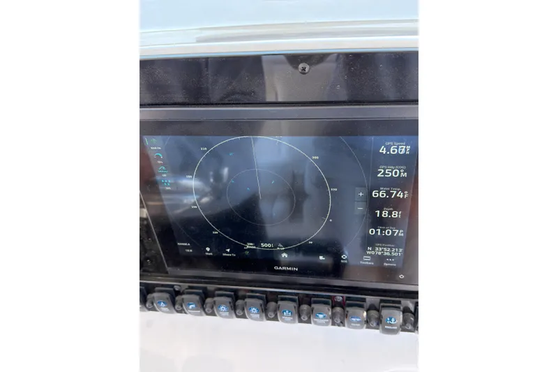 Slide: The Image of Garmin marine display on 2025 Sea Hunt Ultra 275 SE boat dashboard. - 32
