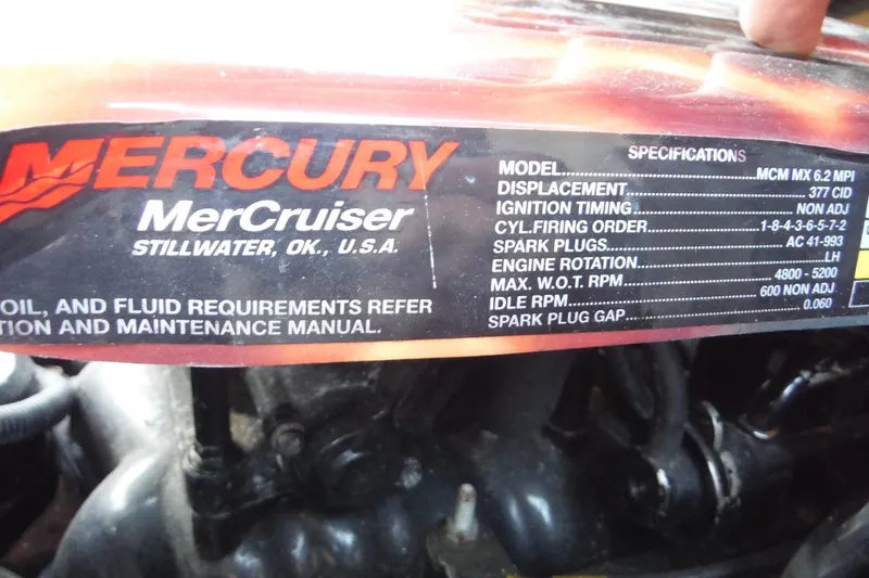 Slide: The Image of Mercury MerCruiser engine specifications label on a 2005 Sea Ray 220 Sundeck. - 21