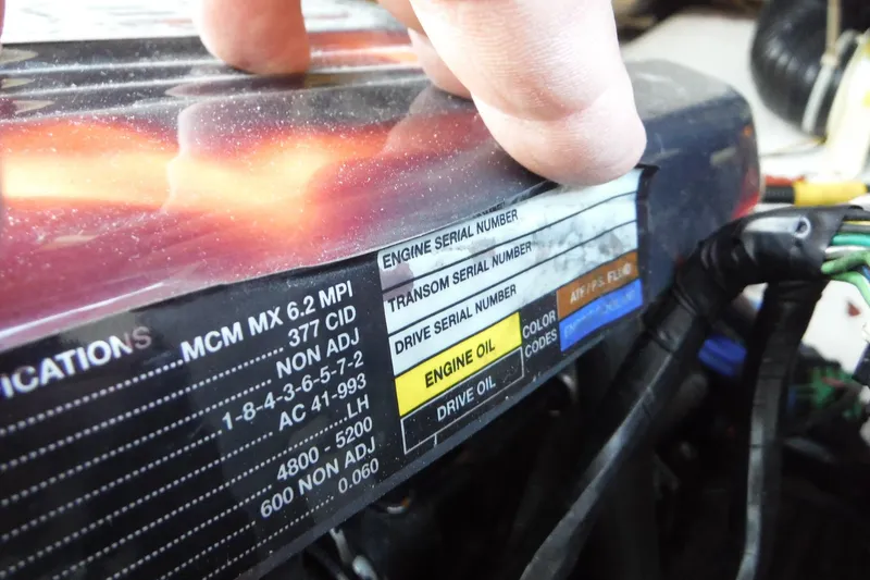 Slide: The Image of Engine specifications label on a 2005 Sea Ray 220 Sundeck boat. - 22