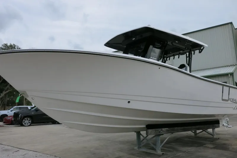 The Image of 2026 Robalo R300 Center Console boat on display, showcasing sleek design and modern features. - 0