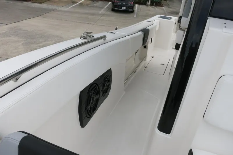 Slide: The Image of 2026 Robalo R300 Center Console boat interior with sleek design and modern features. - 18
