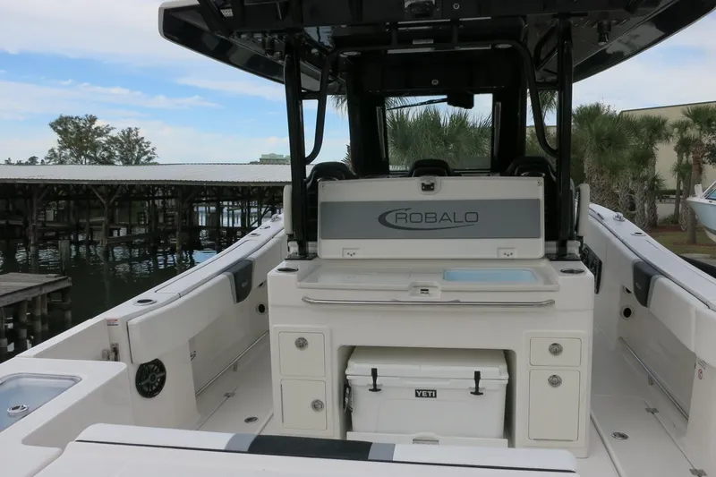 Slide: The Image of 2026 Robalo R300 Center Console boat interior with storage and seating. - 23