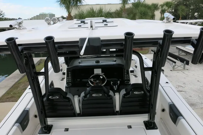 Slide: The Image of 2026 Robalo R300 Center Console boat interior with steering wheel and seating. - 30