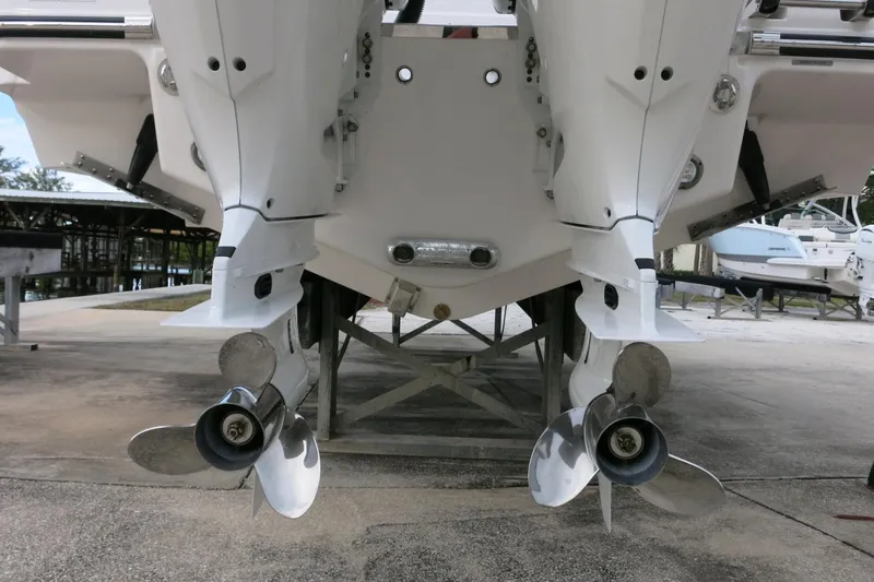 Slide: The Image of 2026 Robalo R300 Center Console boat with dual outboard engines on display. - 32