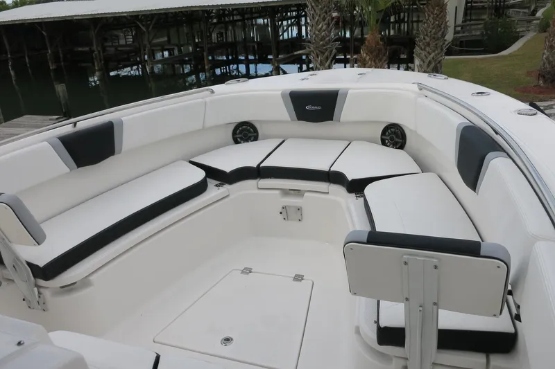 Slide: The Image of 2026 Robalo R300 Center Console boat with spacious seating and sleek design. - 8