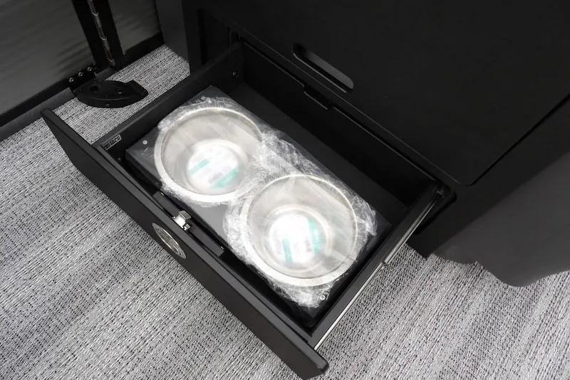 Slide: The Image of Drawer with two packaged bowls in a 2026 Bennington M L-Bench 22 ML boat. - 10