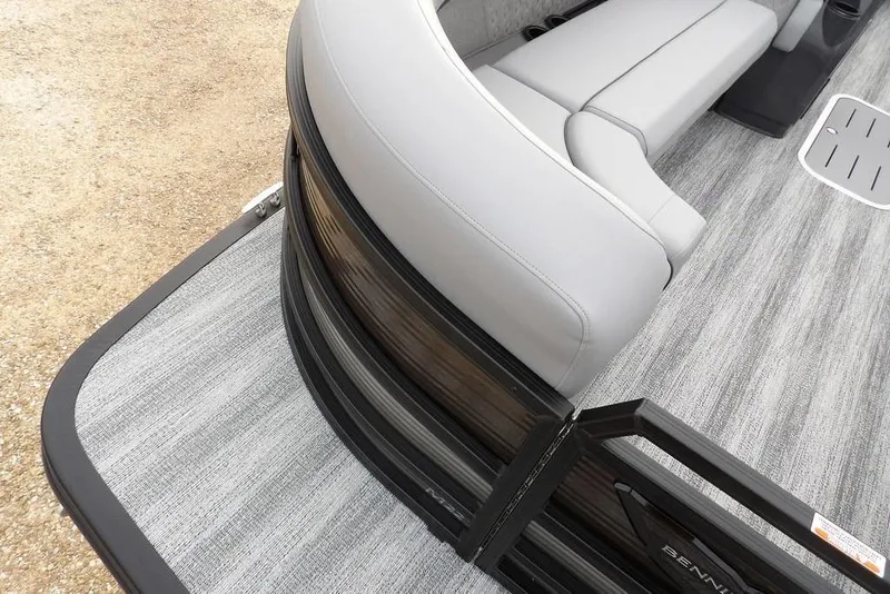 Slide: The Image of 2026 Bennington M L-Bench 22 ML pontoon boat interior with gray seating and flooring. - 15