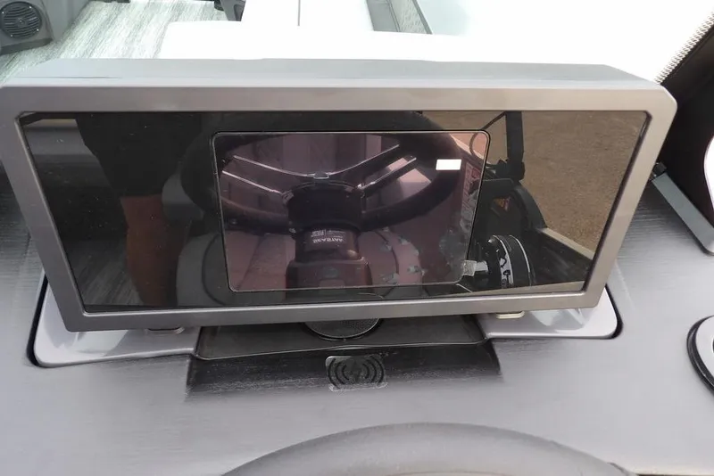 Slide: The Image of 2026 Bennington M L-Bench 22 ML dashboard with digital display screen. - 20