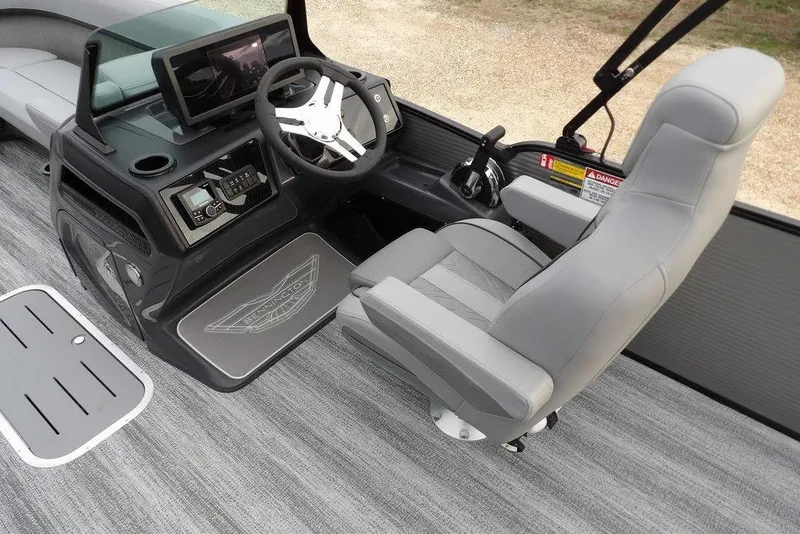 Slide: The Image of 2026 Bennington M L-Bench 22 ML boat interior with modern helm and seating. - 21