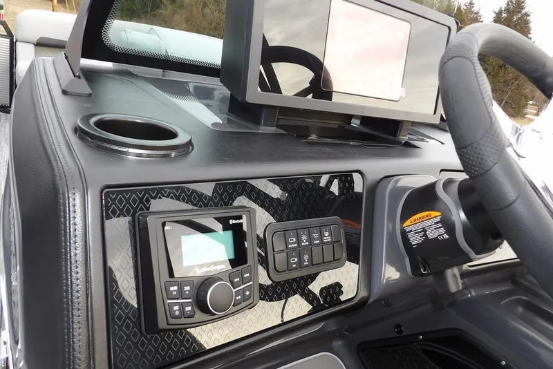 Slide: The Image of Dashboard of 2026 Bennington M L-Bench 22 ML with control panel and display. - 27