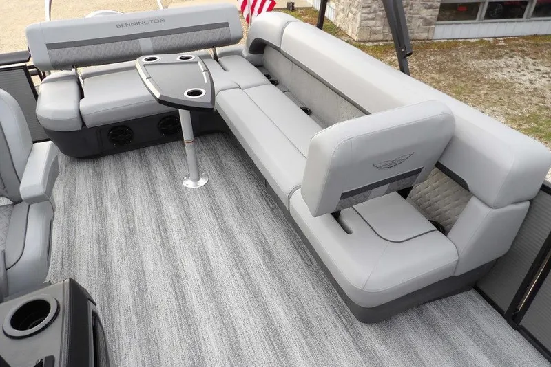 Slide: The Image of 2026 Bennington M L-Bench 22 ML pontoon boat interior with gray seating and table. - 30