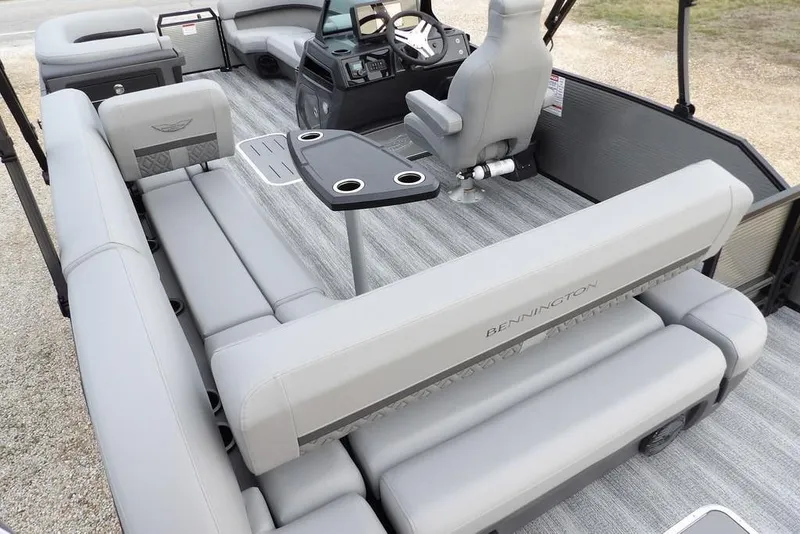Slide: The Image of 2026 Bennington M L-Bench 22 ML pontoon boat with luxurious seating and modern helm. - 40