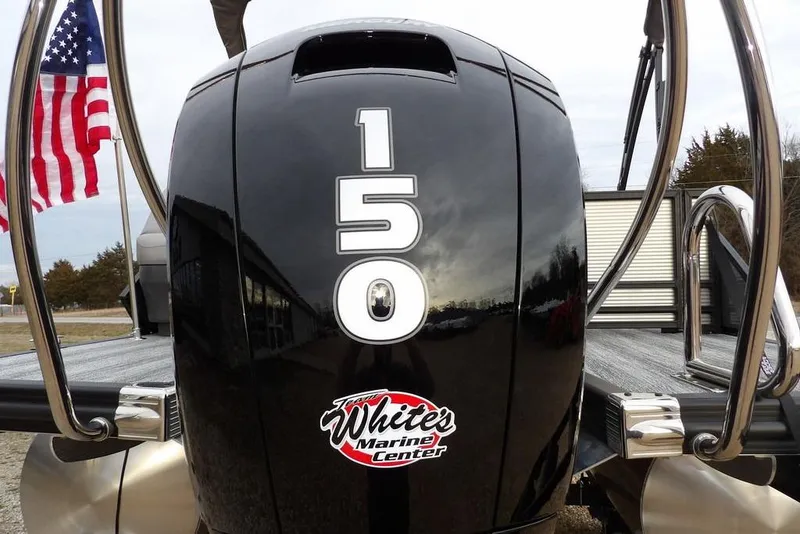 Slide: The Image of 2026 Bennington M L-Bench 22 ML boat with 150 horsepower engine and American flag. - 42