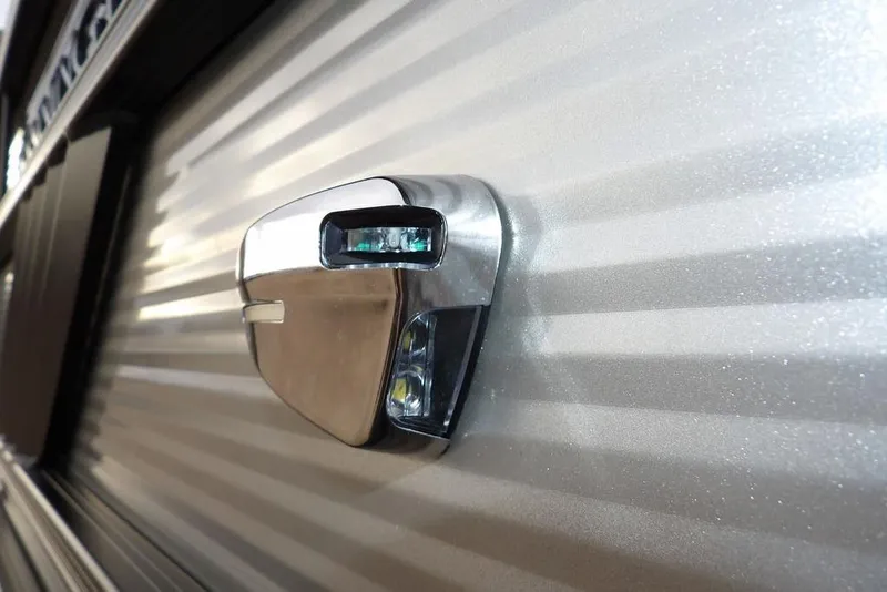 Slide: The Image of Close-up of a 2026 Bennington M L-Bench 22 ML boat detail, showcasing sleek metallic design. - 44