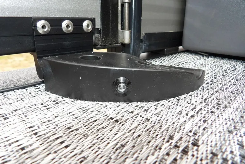 Slide: The Image of Close-up of Bennington M L-Bench 22 ML 2026 boat hinge detail on textured surface. - 51