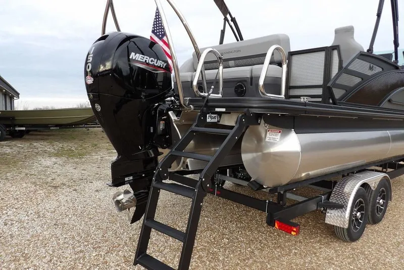 Slide: The Image of 2026 Bennington M L-Bench 22 ML pontoon boat with Mercury outboard motor. - 52