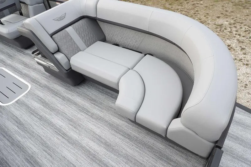 Slide: The Image of Luxurious seating on 2026 Bennington M L-Bench 22 ML pontoon boat, featuring elegant gray upholstery. - 8