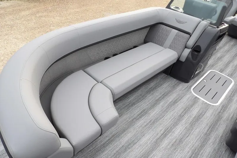 Slide: The Image of 2026 Bennington M L-Bench 22 ML boat interior with luxurious gray seating and modern design. - 9