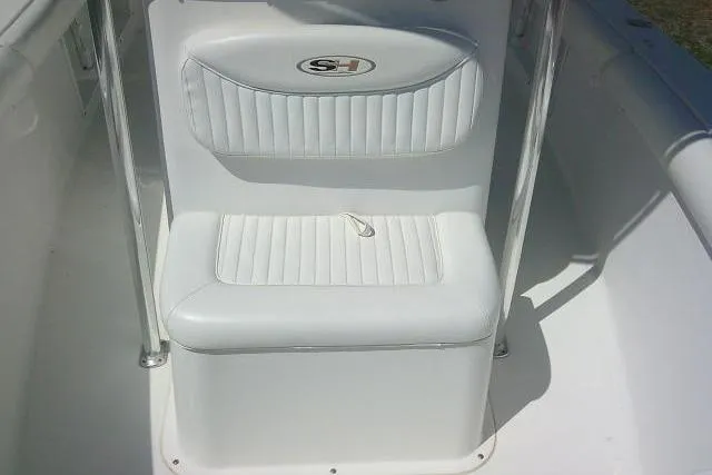 Slide: The Image of White seating on 2010 Sea Hunt Triton 202 boat, featuring sleek design and comfort. - 16
