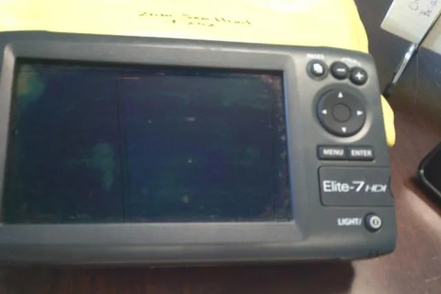 Slide: The Image of Fishfinder device on a Sea Hunt Triton 202 boat, model Elite-7 HDI, 2010. - 35