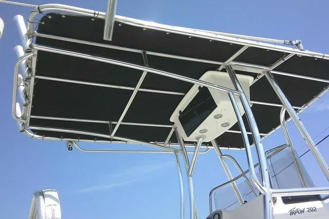 Slide: The Image of 2010 Sea Hunt Triton 202 boat with T-top and electronics, viewed from below. - 8