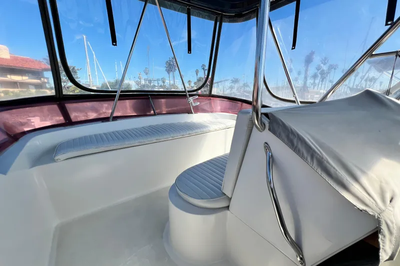 Slide: The Image of Interior of 1990 Mediterranean 38 Sport Fisher boat with seating and clear windows. - 21