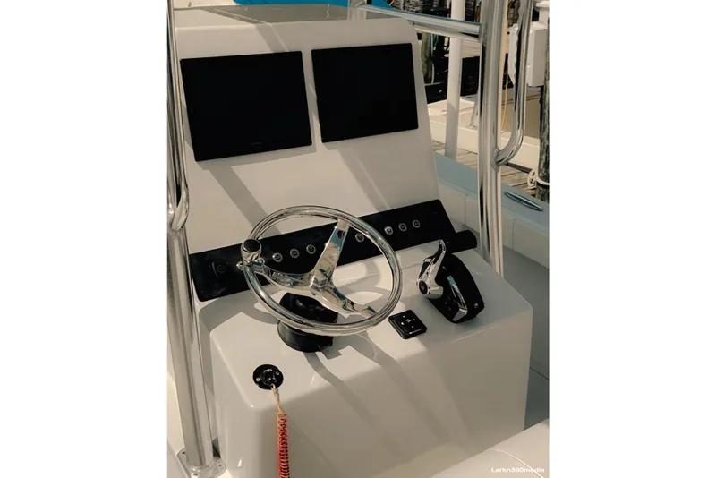 Slide: The Image of Clean dash setup on the 2025 LTB 25 Demo Boat, with more room for a VHF, or whatever you would like. - 5
