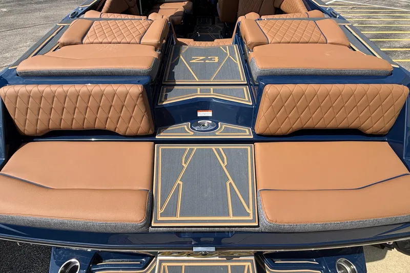Slide: The Image of 2026 Tigé Z3 boat interior with luxurious tan seating and stylish design. - 10