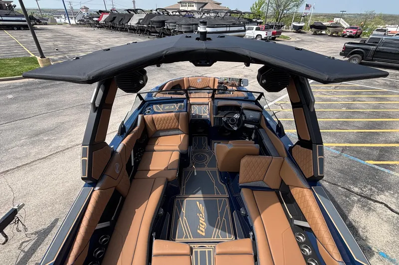 Slide: The Image of 2026 Tigé Z3 boat interior with luxurious seating and modern dashboard. - 17