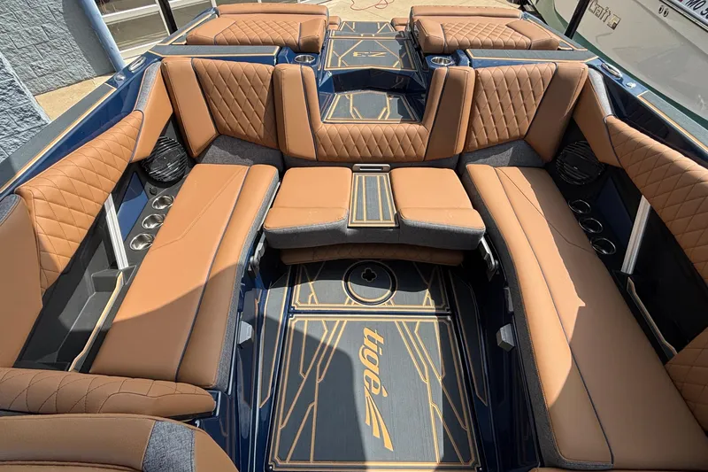 Slide: The Image of Luxurious interior of 2026 Tigé Z3 boat with tan leather seating and stylish design. - 18