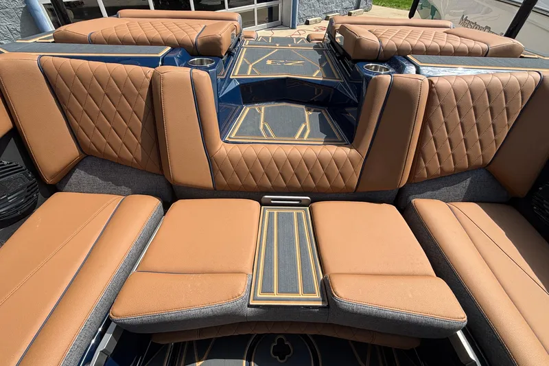 Slide: The Image of Luxurious interior of 2026 Tigé Z3 boat with tan quilted seating and stylish design. - 20