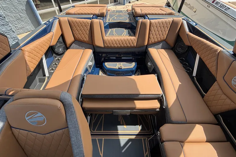Slide: The Image of Luxurious interior of 2026 Tigé Z3 boat with tan leather seating and modern design. - 24