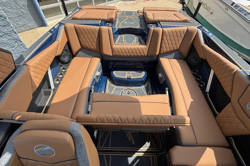 Slide: The Image of Luxurious interior of 2026 Tigé Z3 boat with tan leather seating and modern design. - 25