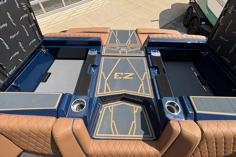 Slide: The Image of 2026 Tigé Z3 boat interior with luxurious brown seating and stylish blue accents. - 32