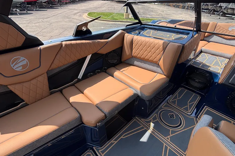 Slide: The Image of Luxurious interior of 2026 Tigé Z3 boat with tan leather seating and stylish design. - 36