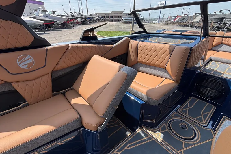 Slide: The Image of Luxurious interior of 2026 Tigé Z3 boat with tan leather seating and modern design. - 37